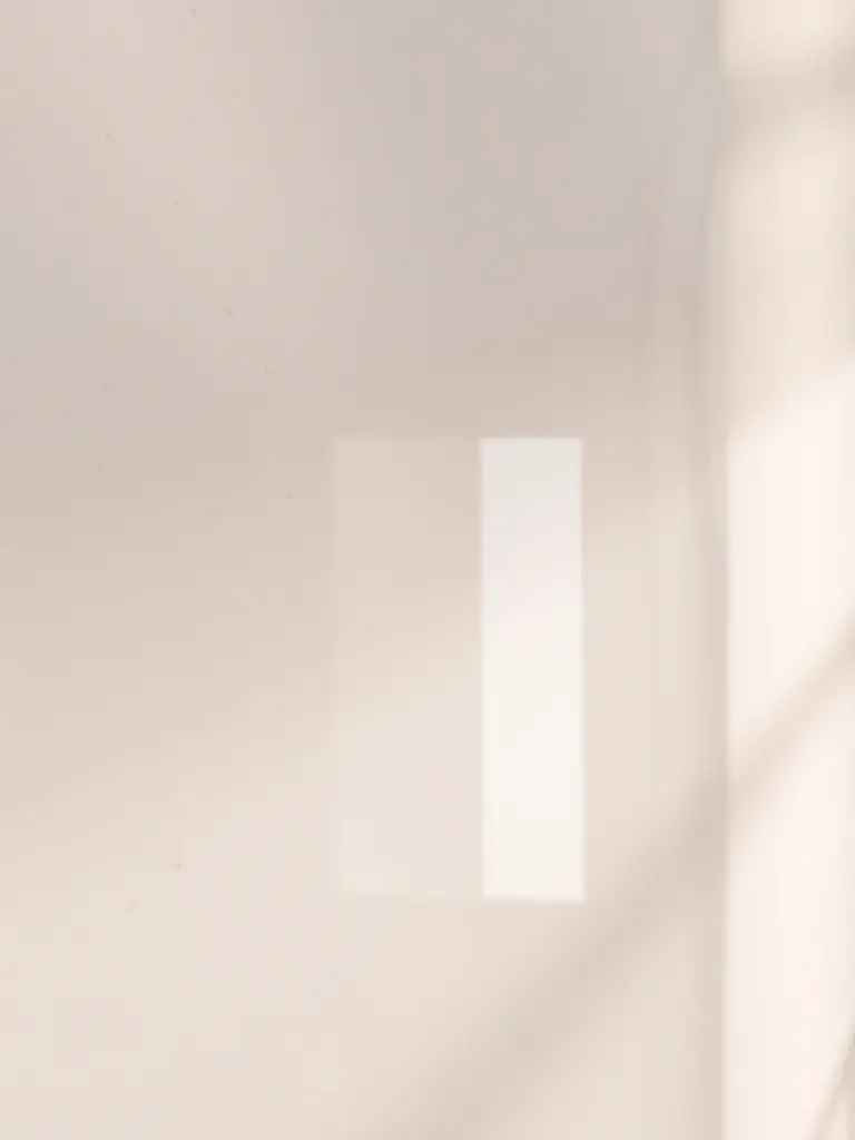 A high-resolution image of a wall adorned with Fyqon's Venus collection, showcasing its smooth, polished surface and luxurious, reflective quality.
